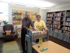 Friends of the Library helping shelve books